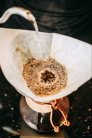 Making coffee using a pour-over method like Chemex
